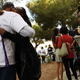 Voters hug in the line at a polling place to participate in early voting in California’s 25th Congressional district on November 4, 2018 in Lancaster, California.